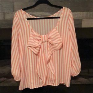 Bow, low backed blouse 3/4 sleeves